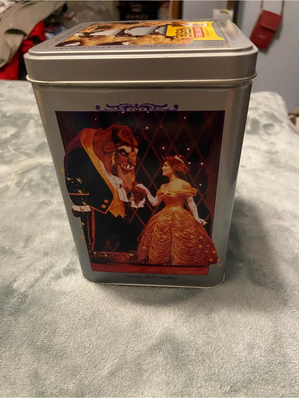 Disney Silver Metal Tin with Blue, Black, Gold and Purple Artwork